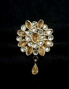 Kundan with champagne stones adjustable ring.