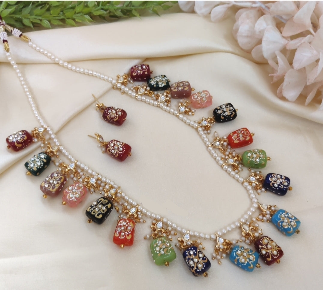 Hand crafted Designer kundan long haar with hand painted tanjore beads.